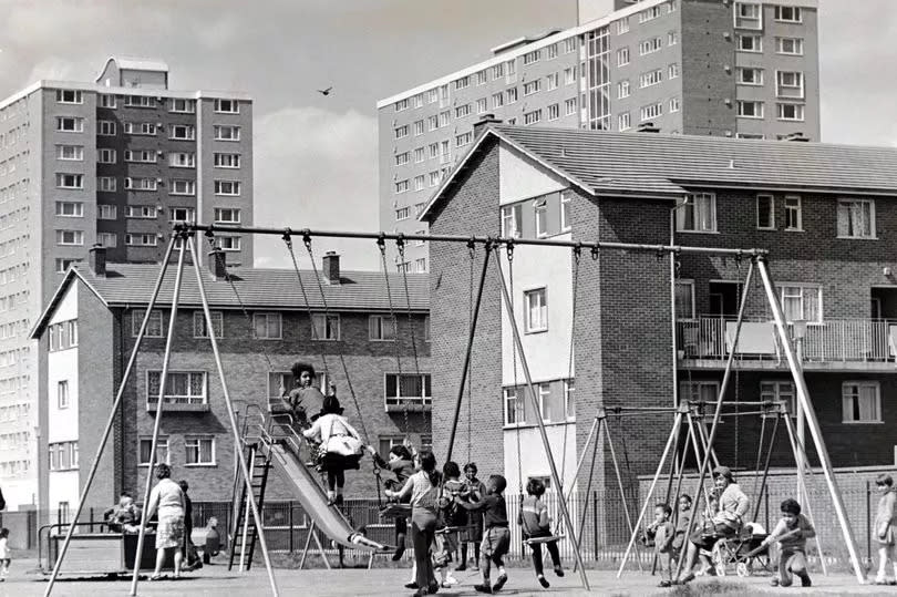 Cardiff - Old - Butetown - Local children enjoy themselves playing in the playground on the swings, slide and roundabout - 19th May 1967 - Western Mail and Echo Ltd