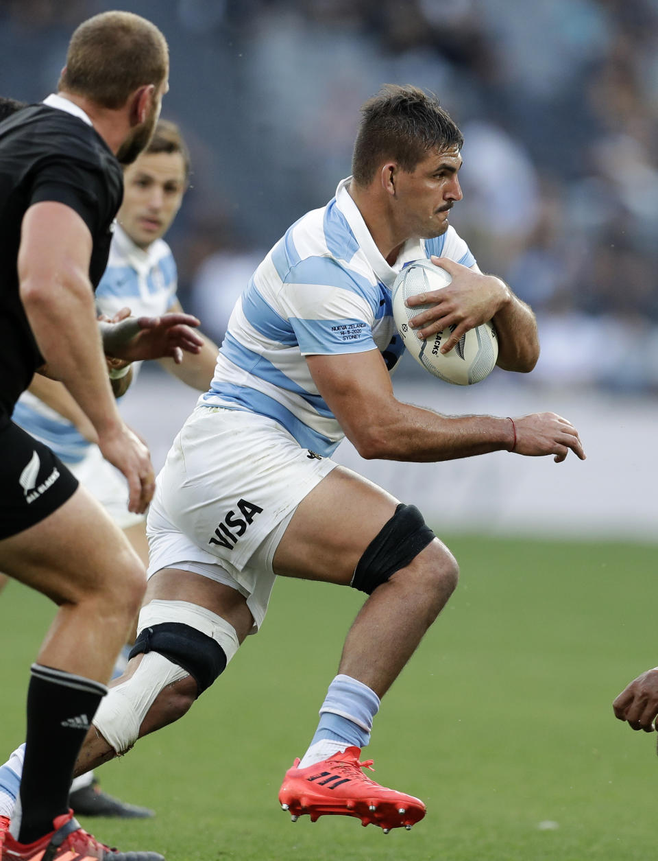 FILE - In this Saturday, Nov. 14, 2020, file photo Argentina's Pablo Matera makes a run during the Tri-Nations rugby test between Argentina and New Zealand at Bankwest Stadium in Sydney, Australia. Matera has been stripped of the captaincy of the Argentina national rugby team and suspended along with two teammates over historic social media posts which have been deemed “discriminatory and xenophobic.” (AP Photo/Rick Rycroft, File)