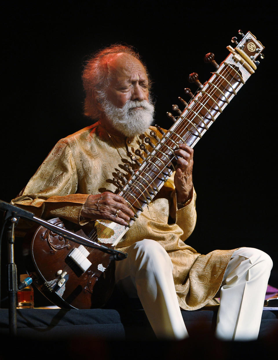  In this Feb. 7, 2012 file photo, Indian musician Ravi Shankar performs during a concert in Bangalore, India. Shankar, the sitar virtuoso who became a hippie musical icon of the 1960s after hobnobbing with the Beatles and who introduced traditional Indian ragas to Western audiences over an eight-decade career, has died. He was 92. (AP Photo/Aijaz Rahi, File)