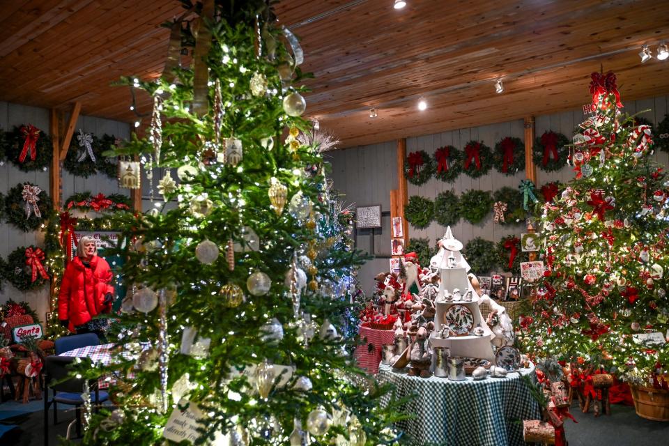 Various holiday decorations and other gifts on display in the store at Tannenbaum Farms on Monday, Nov. 20, 2023, in Mason.