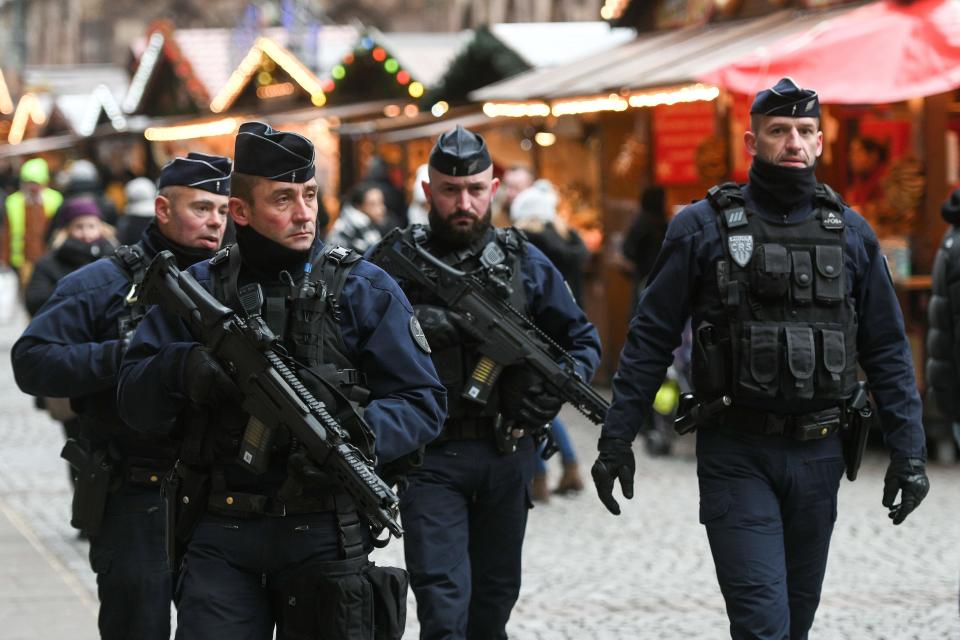 French policemen patrol during the reopening of the Christmas market of Strasbourg, eastern France, on Dec.14, 2018 as the author of the attack was killed on Dec. 13, 2018. The Chrismas market closed as three people were killed and 13 wounded when a lone gunman, identified as Cherif Chekatt, 29, opened fire on shoppers on Dec. 11, 2018. (Photo: Sebastien Bozon/AFP/Getty Images)