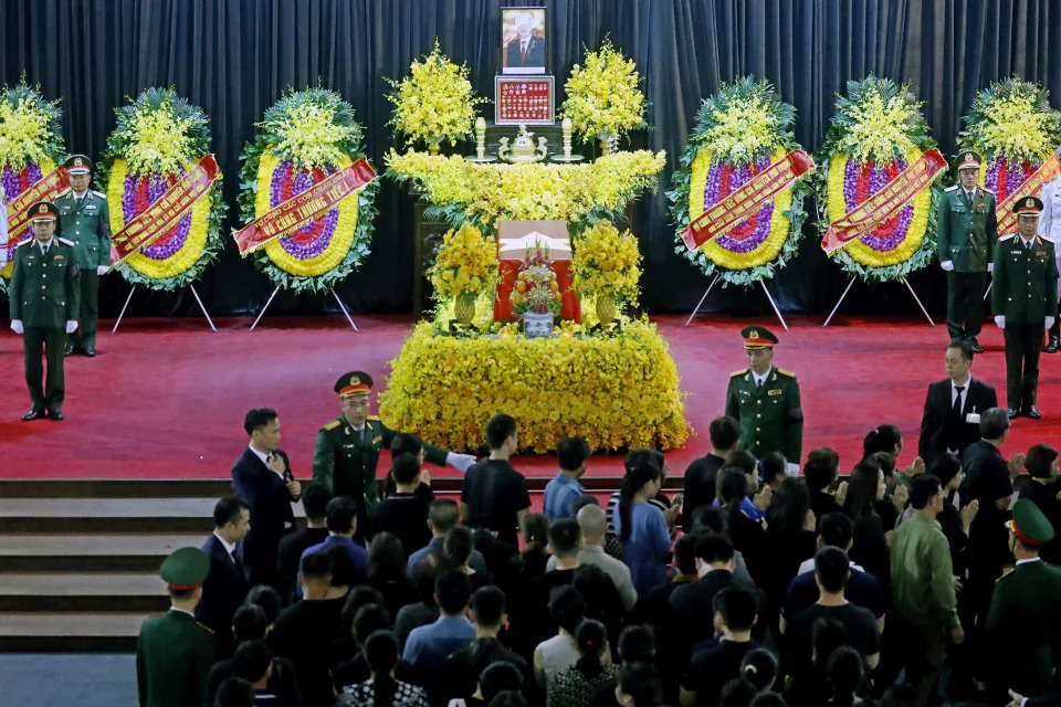 People line up to pay respects to Vietnam's General Secretary of the Communist Party Nguyen Phu Trong in Hanoi, Vietnam, Friday, July 26, 2024. (AP Photo/Minh Hoang)