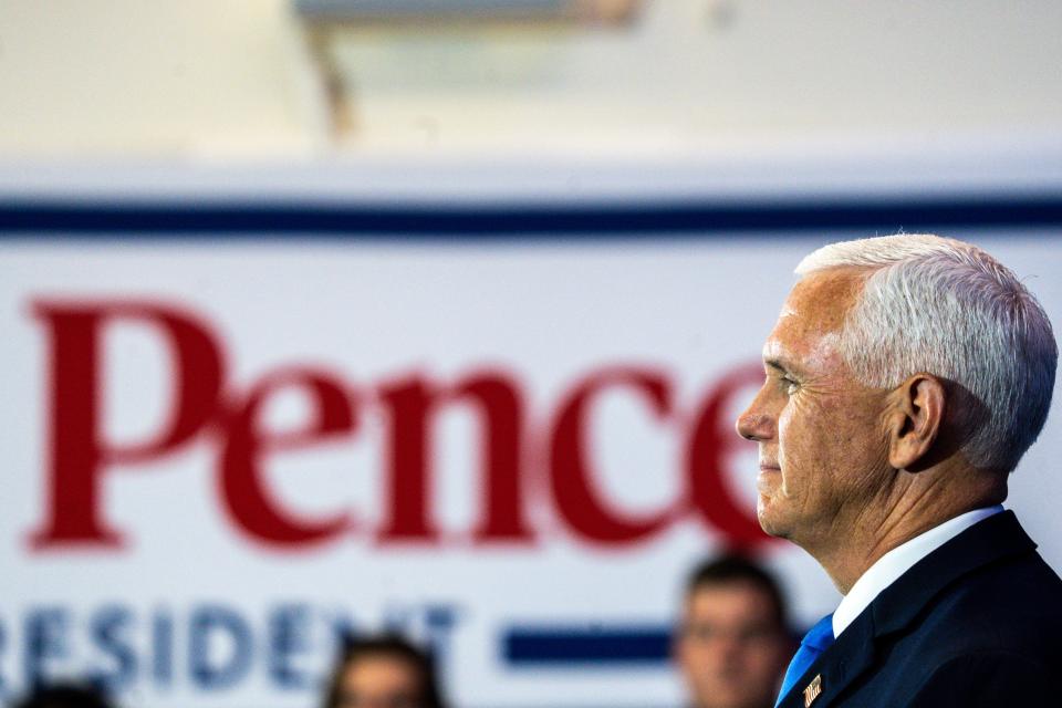 Former Vice President Mike Pence stands while former Second Lady Karen Pence speaks during a campaign announcement rally at the FFA Enrichment Center on the DMACC campus on Wednesday, June 7, 2023, in Ankeny.