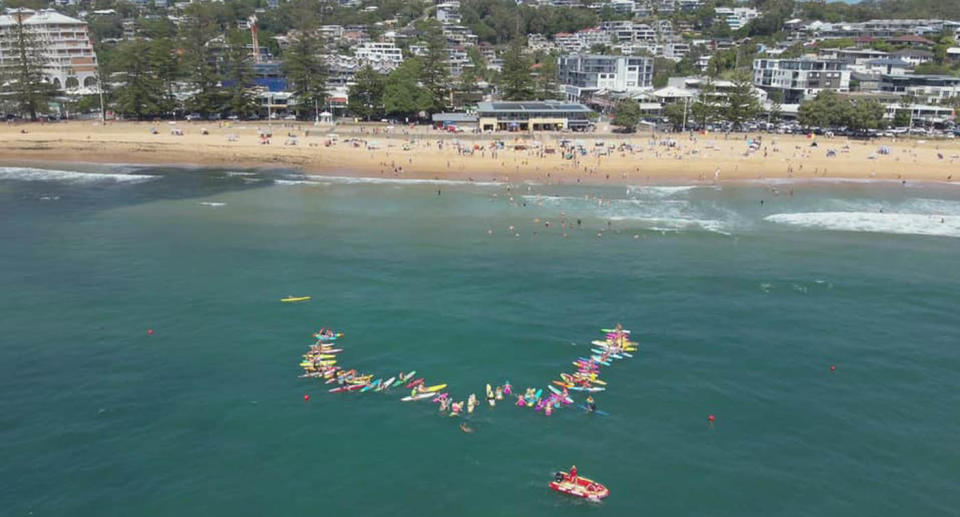 Terrigal beach and ocean with swimmers. 