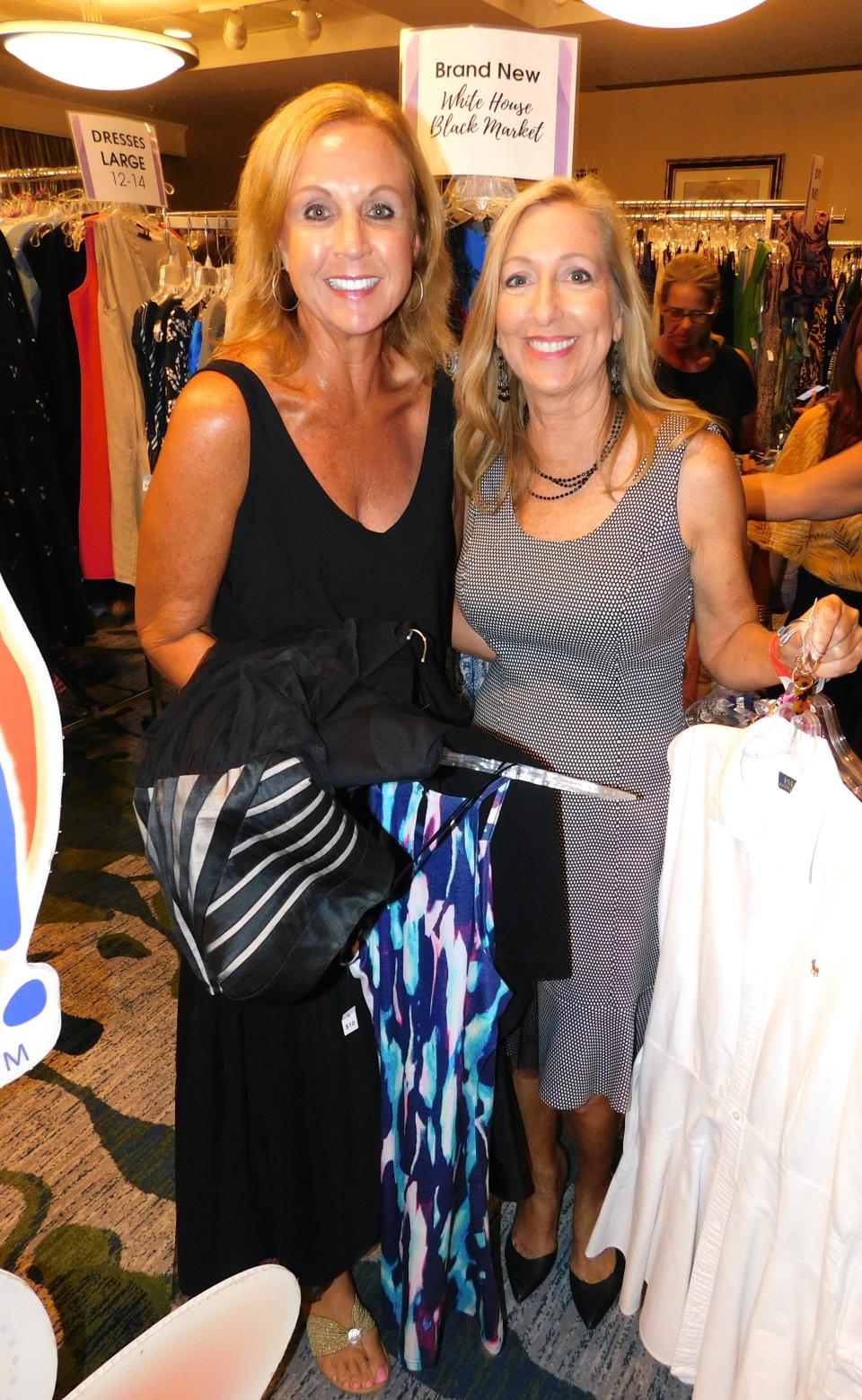 Sandra Pavelka and Linda Doggett attend a 2022 Love That Dress! event.