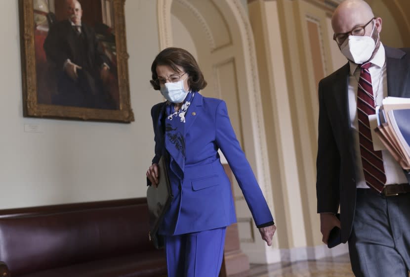 Sen. Dianne Feinstein, D-Calif., arrives as opening arguments begin in former President Donald Trump's impeachment trial, at the Capitol in Washington, Wednesday, Feb. 10, 2021. (AP Photo/J. Scott Applewhite)