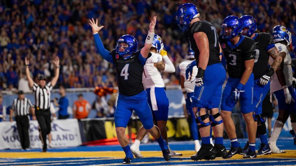 Boise State quarterback Maddux Madsen celebrates his rushing touchdown in the second quarter that cut San Jose State’s lead to 27-14.