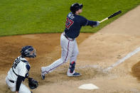 Atlanta Braves Austin Riley, right, and New York Yankees catcher Gary Sanchez watch Riley's ninth-inning solo home run in a baseball game Wednesday, April 21, 2021, at Yankee Stadium in New York. The Braves won 4-1. (AP Photo/Kathy Willens)