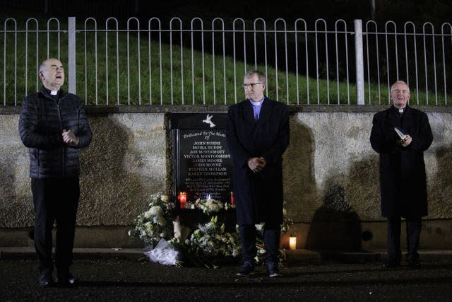 From left, Monsignor Andrew Dolan, Rev Lindsay Blair, and Fr Noel McDermott lead prayers outside the Rising Sun pub (Liam McBurney 