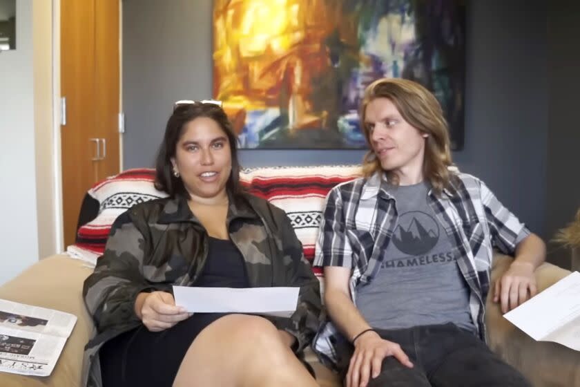 This screenshot of a YouTube interview on April 22, 2023, from user Malcolm Davon Smith, shows former Houghton University employees Raegan Zelaya, left, and Shua Wilmot after they were fired from the school. (Malcolm Davon Smith via AP)