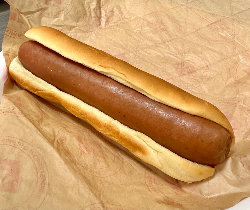 A lonely hot dog from Sam's Club Food Court sits waiting for our embellishments of mustard and perhaps some sauerkraut.