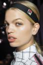 <p>Black headbands are always chic, but we love the logo-fied version from Fila's spring show.</p>