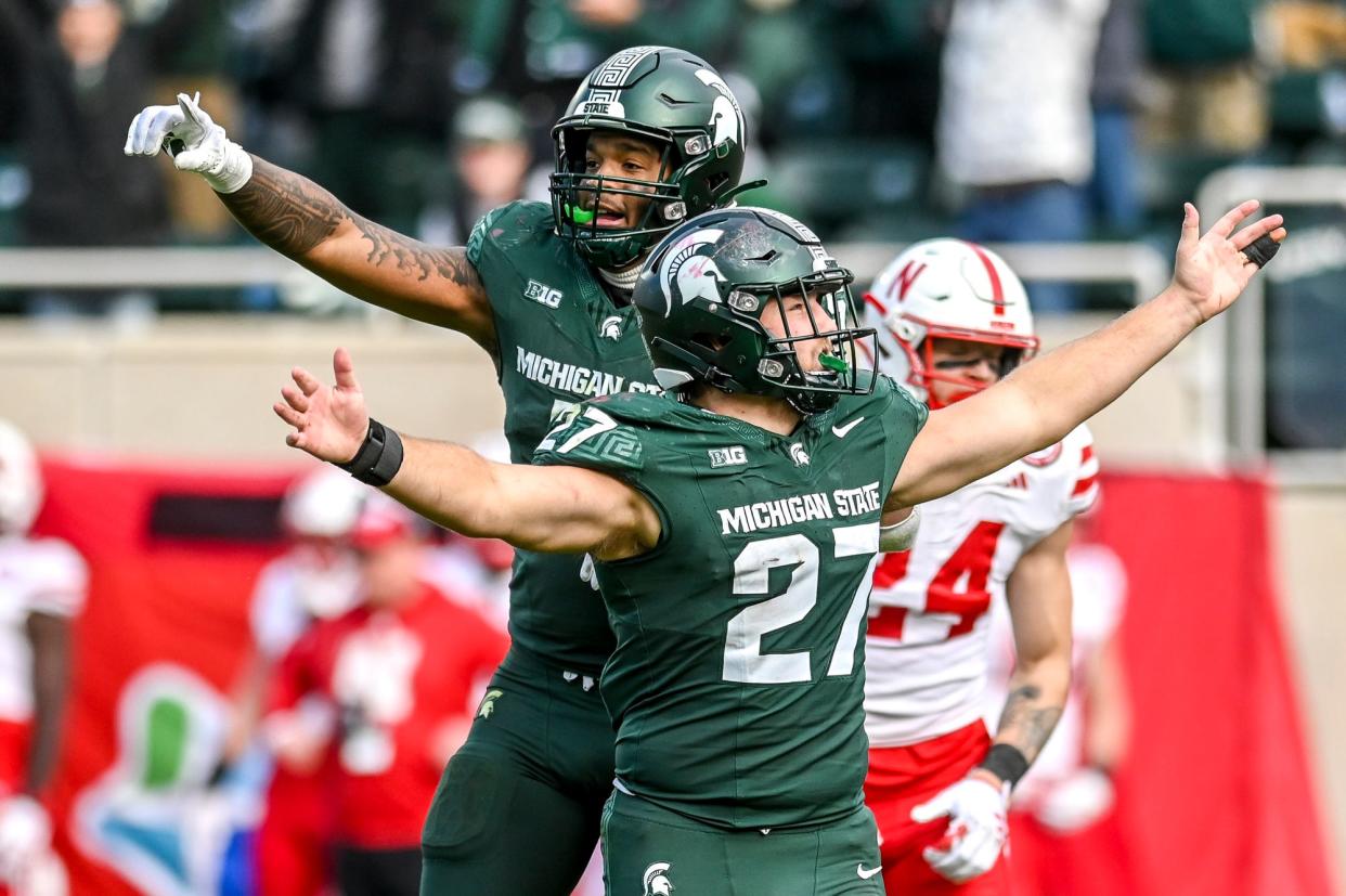 Michigan State's Jordan Hall, left, and Cal Haladay celebrate after beating Nebraska on Saturday, Nov. 4, 2023, at Spartan Stadium in East Lansing.