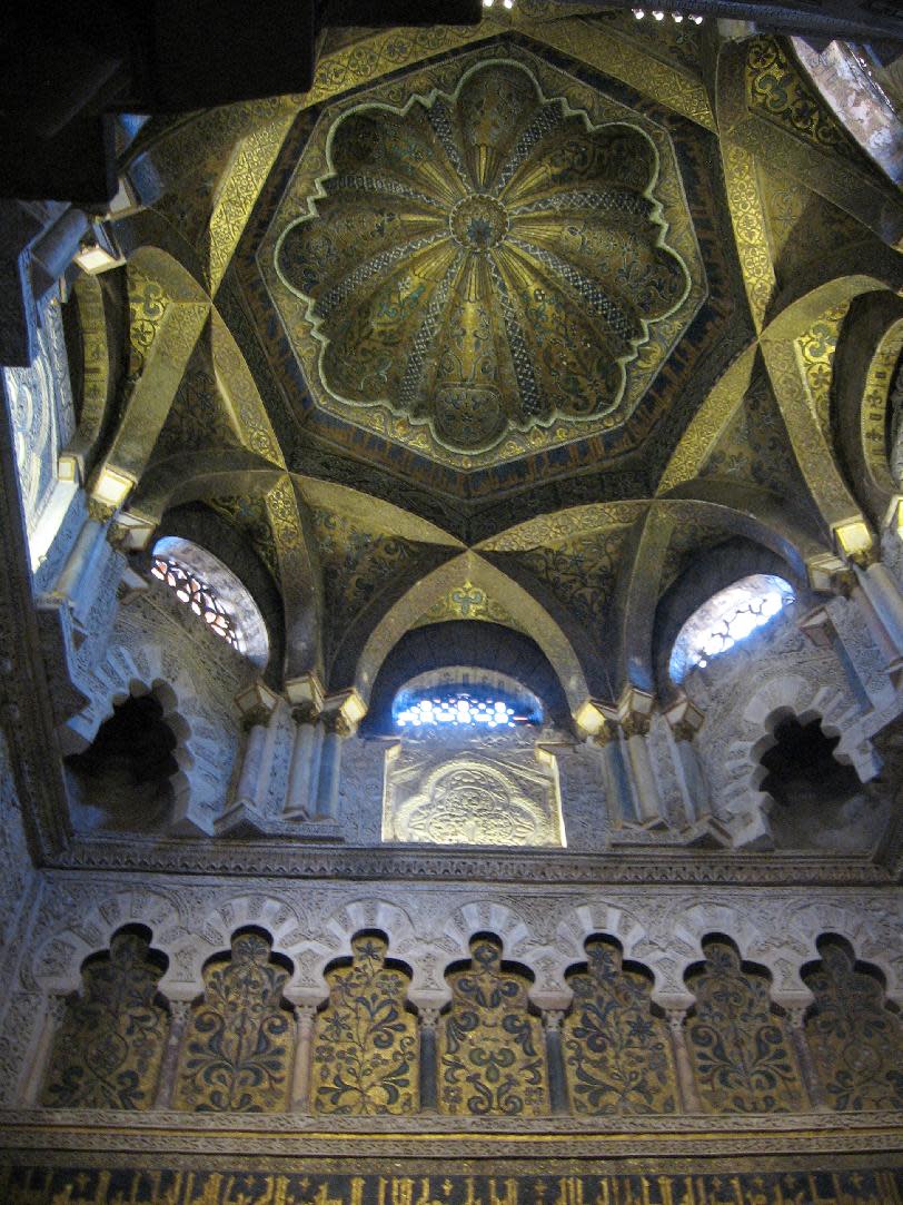 This June 4, 2013 photo shows mosaics covering a vault in the Mezquita, in Cordoba, in Andalusia, Spain, now the city's cathedral, which originated as a mosque when the city was the center of Islamic Europe a thousand years ago. Andalusia offers a fusion of Christian and Islamic cultures, found in architectural masterpieces and in everyday life. (AP Photo/Giovanna Dell’Orto)