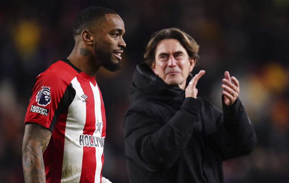 Brentford's Ivan Toney and manager Thomas Frank celebrate the win after the English Premier League soccer match between Brentford and Nottingham Forest, at the Gtech Community Stadium, in London, Saturday, Jan. 20, 2024. (John Walton/PA via AP)