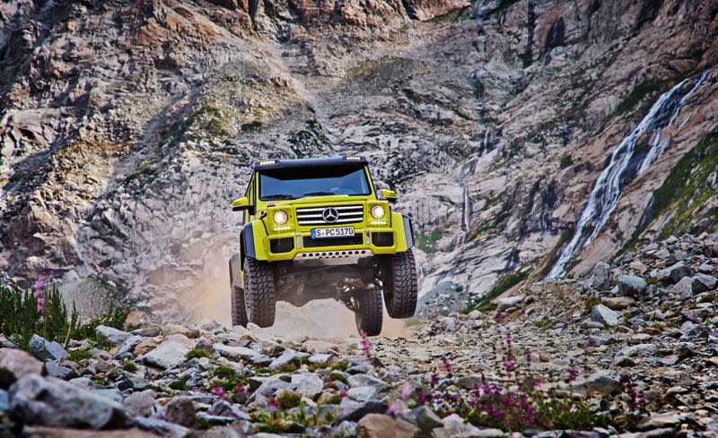 Mercedes G550 4x4 Squared, boxy SUV, taking a jump off road