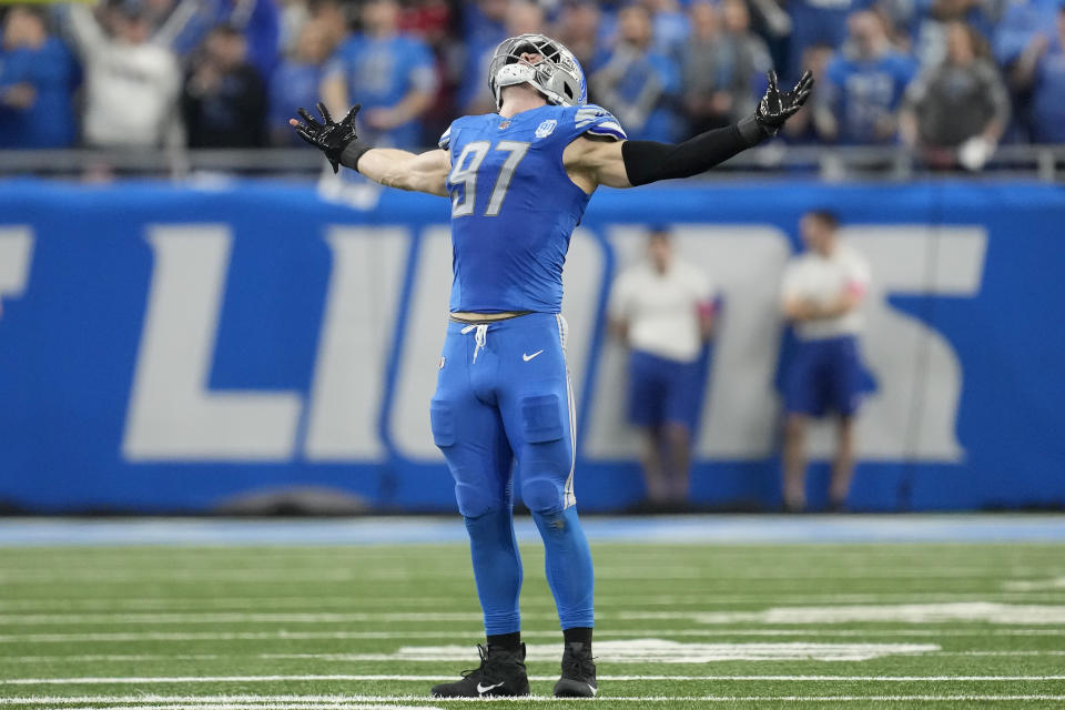 Detroit Lions defensive end Aidan Hutchinson reacts after a play against the Tampa Bay Buccaneers during the second half of an NFL football NFC divisional playoff game, Sunday, Jan. 21, 2024, in Detroit. (AP Photo/Paul Sancya)