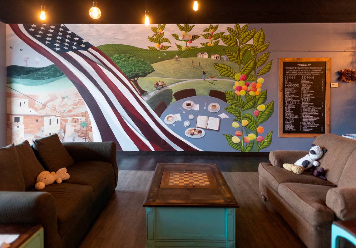 The mural on the wall at Sojourner’s Coffee House pays tribute to veterans.