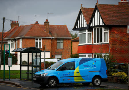 FILE PHOTO: A British Gas van is seen parked outside a home in Loughborough, central England October 17, 2013. REUTERS/Darren Staples/File Photo