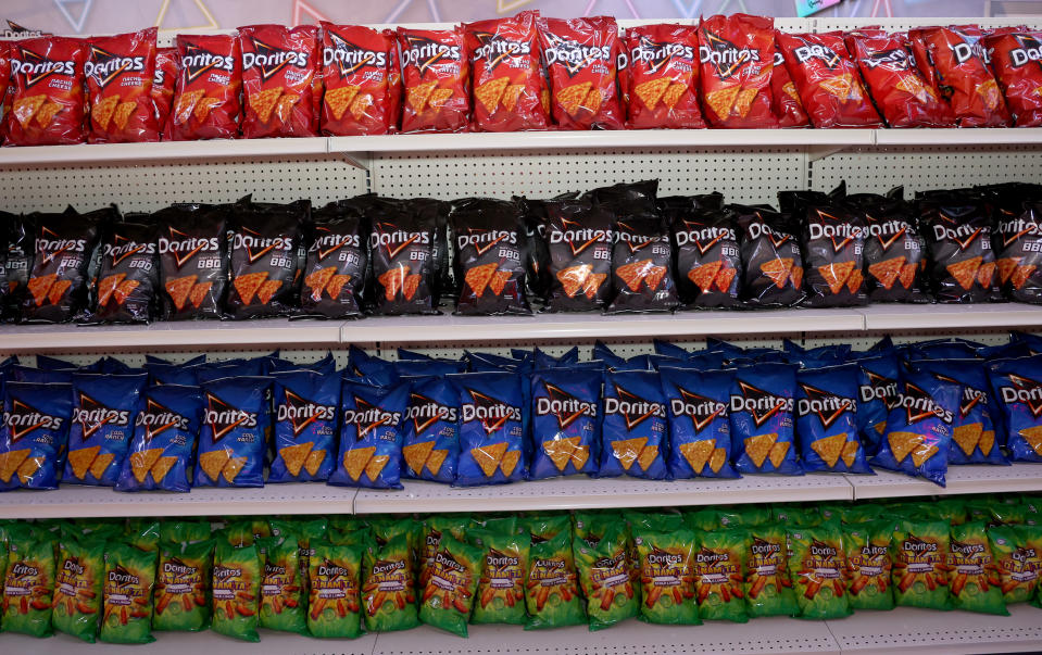 LAS VEGAS, NEVADA - OCTOBER 20: Bags of Doritos are displayed in the Doritos Mart booth during TwitchCon 2023 Las Vegas at the Las Vegas Convention Center on October 20, 2023 in Las Vegas, Nevada. (Photo by Gabe Ginsberg/Getty Images)