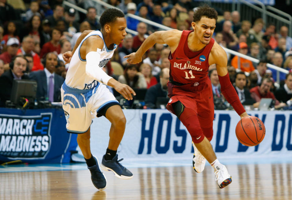 Fatts Russell (left) takes on Oklahoma’s Trae Young. (Getty)