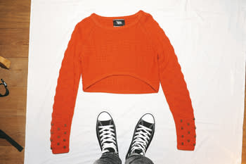 orange knit with skull studd top $3,699