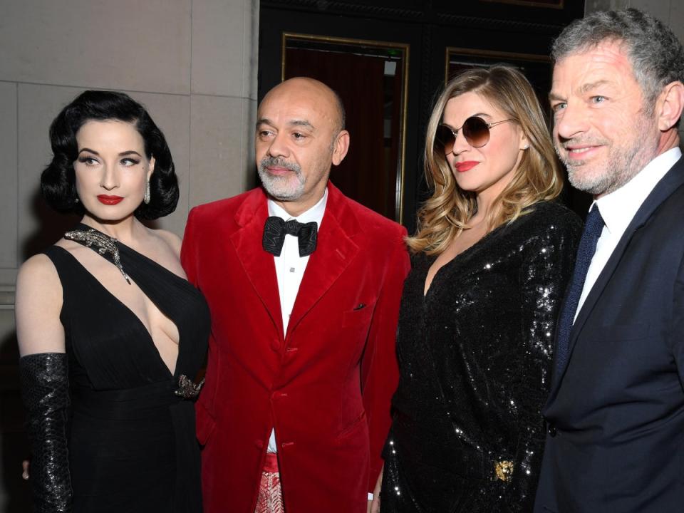 Gardot with Dita von Teese, Christian Louboutin and Jacques Bungert during Paris Fashion Week 2020 (Getty)