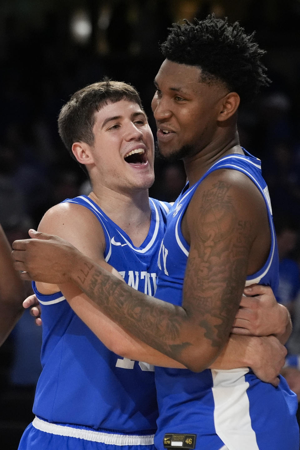 Kentucky's Reed Sheppard, left, and Justin Edwards, right, celebrate the team's 109-77 win against Vanderbilt after an NCAA college basketball game Tuesday, Feb. 6, 2024, in Nashville, Tenn. (AP Photo/George Walker IV)