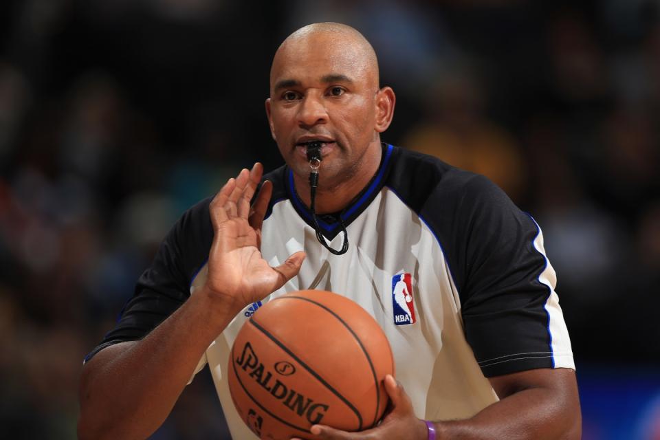 NBA referee Kevin Cutler works a Suns-Nuggets game earlier this season in Denver.