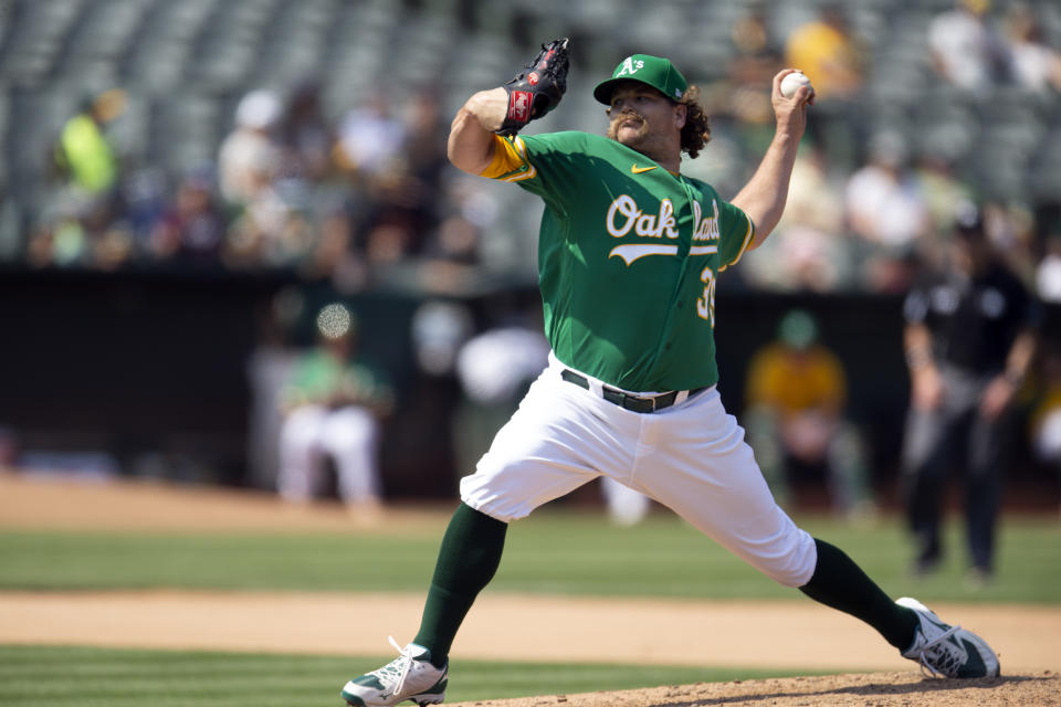 Oakland Athletics pitcher Andrew Chafin (39) delivers a pitch against the Texas Rangers during the seventh inning of a baseball game, Sunday, Aug. 8, 2021, in Oakland, Calif. (AP Photo/D. Ross Cameron)