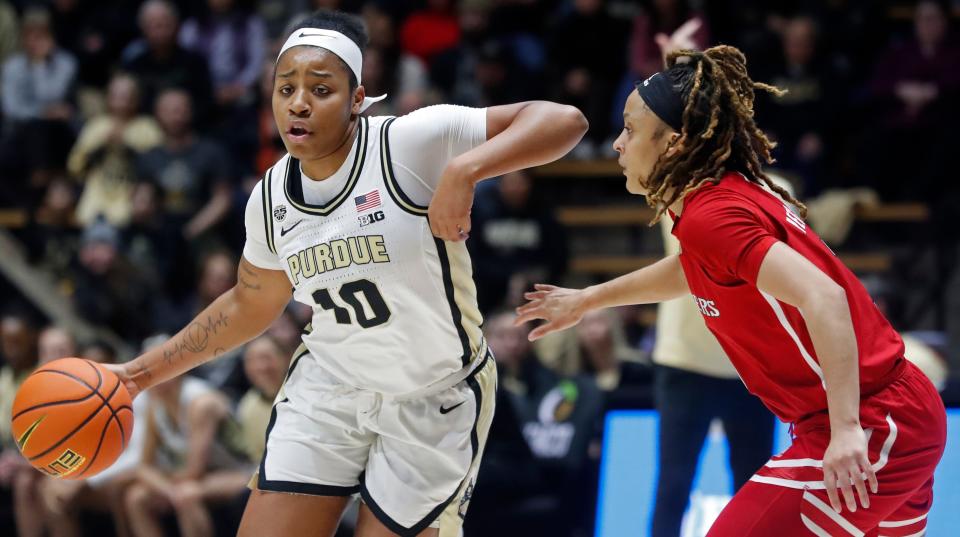 Purdue Boilermakers guard Jeanae Terry (10) drives past Rutgers Scarlet Knights guard Mya Petticord (3) during the NCAA women’s basketball game, Tuesday, Jan. 2, 2024, at Mackey Arena in West Lafayette, Ind.