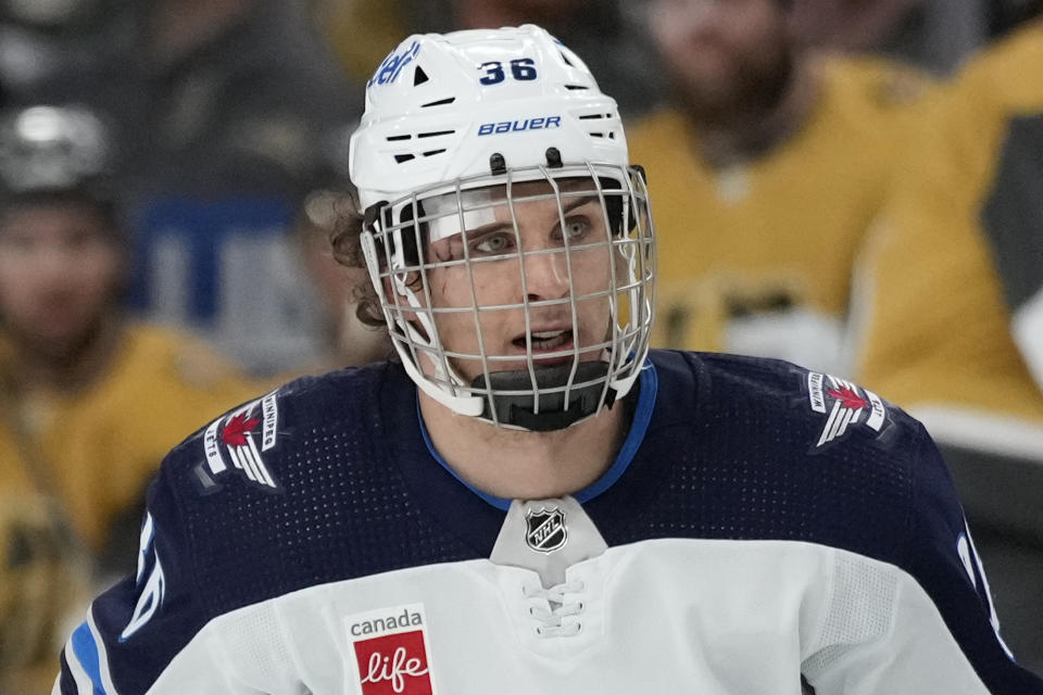 Winnipeg Jets center Morgan Barron (36) plays with a bandage against the Vegas Golden Knights during the second period of Game 1 of an NHL hockey Stanley Cup first-round playoff series Tuesday, April 18, 2023, in Las Vegas. (AP Photo/John Locher)