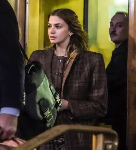 <p>AP Photo/Bebeto Matthews</p> Grace Jabbari leaves court in New York on Dec. 5, 2023.