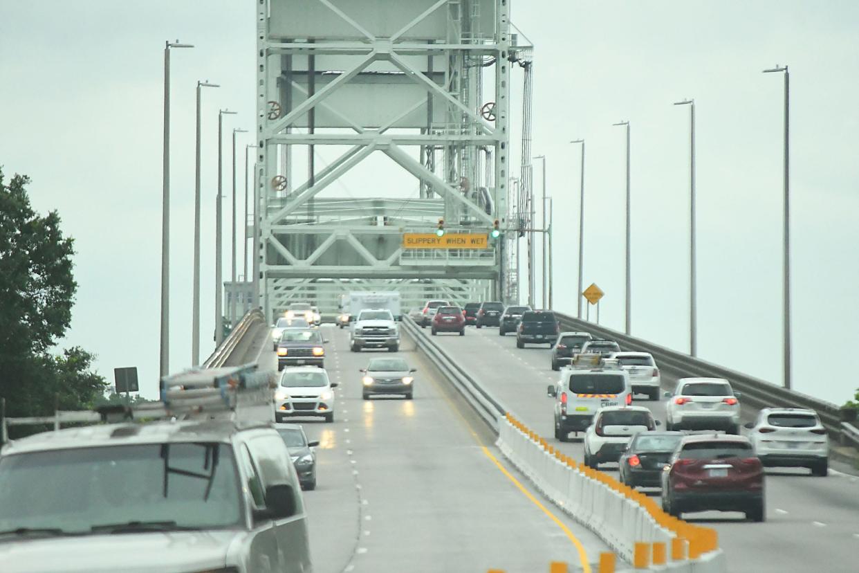Traffic moves across both lanes of the Cape Fear Memorial Bridge after months of restoration. The westbound lanes of the bridge were opened around 5am Thursday May 9, 2024. KEN BLEVINS/STARNEWS