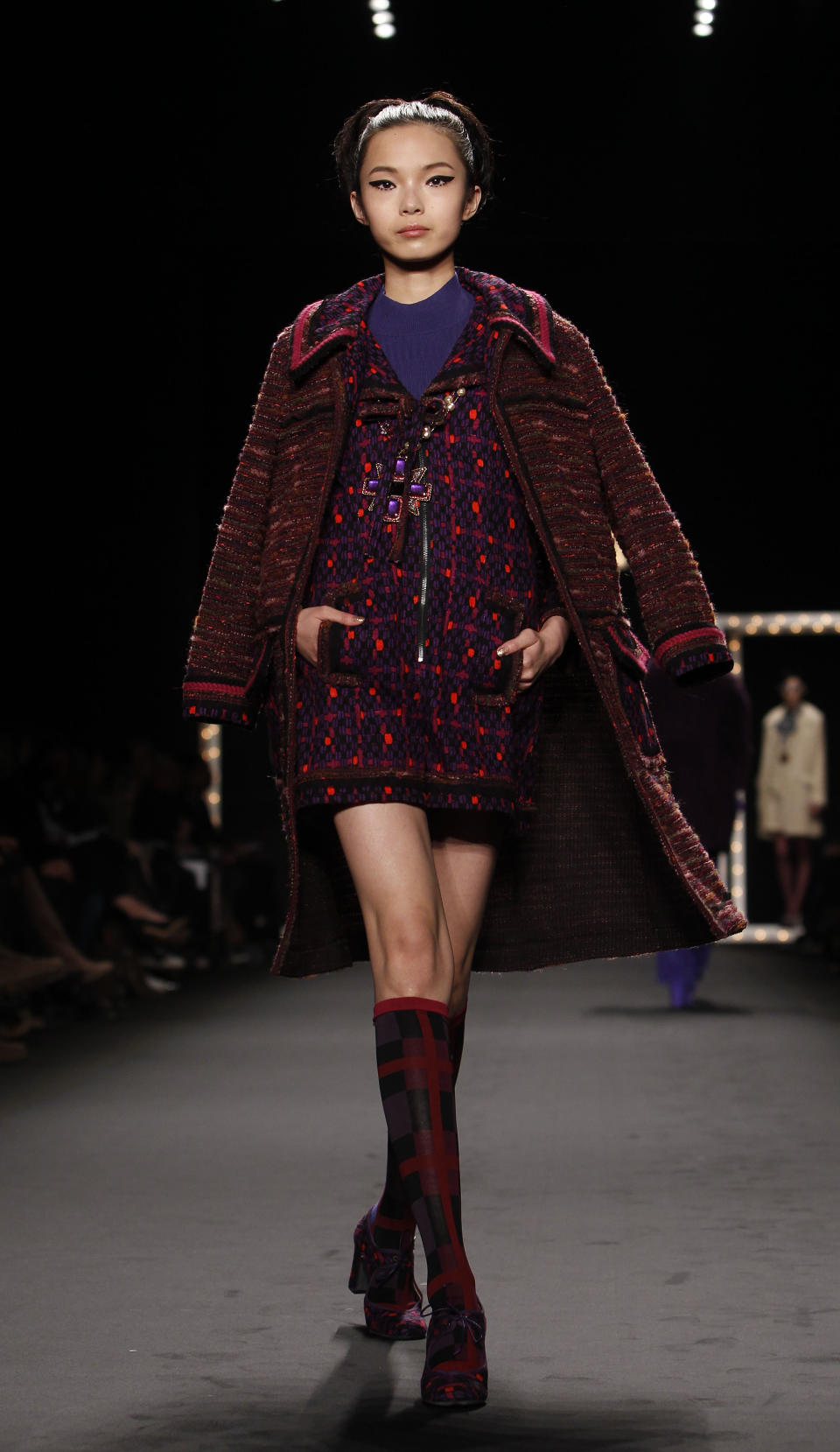 The Anna Sui Fall 2013 collection is modeled during Fashion Week, Wednesday, Feb. 13, 2013 in New York. (AP Photo/Jason DeCrow)