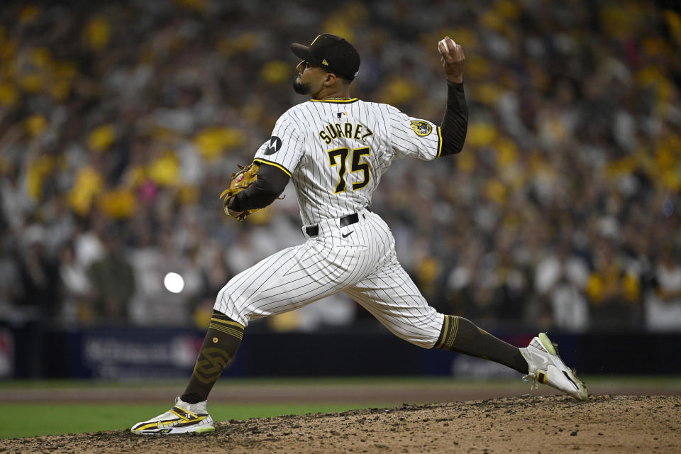 Oct 2, 2024; San Diego, California, USA; San Diego Padres pitcher Robert Suarez (75) throws during the ninth inning of game two in the Wildcard round for the 2024 MLB Playoffs against the Atlanta Braves at Petco Park. Mandatory Credit: Denis Poroy-Imagn Images