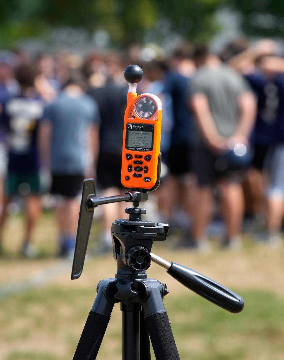 Kestrel 5400 Heat Stress Tracker on the 1st day of high school football practice at Barrington HS.  The device measures Wet Bulb Temperature, Wind Speed, Relative Humidity, Heat Stress Index, Wind Chill and Altitude among other features.   [The Providence Journal / Kris Craig]  