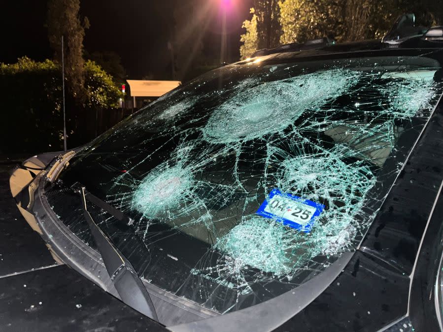 A vehicle in the parking lot of a hotel in Johnson City was damaged overnight in a storm May 9, 2024. (KXAN Photo/Todd Bailey)