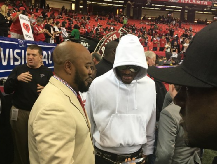 Future (in hoodie) on the Falcons sideline