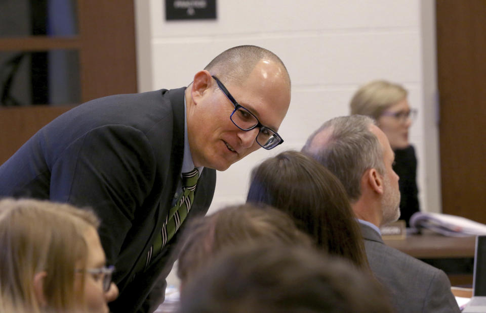 High school teacher Peter Vlaming chats at a West Point School Board hearing in West Point, Virginia on Dec. 6, 2018. | Shelby Lum—AP