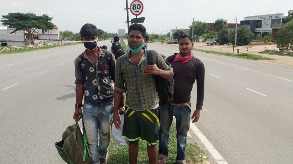 Salman Khan (on the left) as he was walking back home from Bengaluru to UP. 