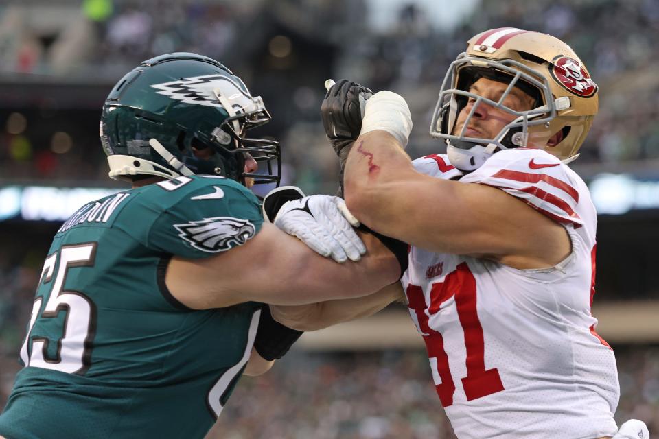 San Francisco 49ers defensive end Nick Bosa (97) battles with Philadelphia Eagles offensive tackle Lane Johnson (65) during the second quarter in the NFC Championship game at Lincoln Financial Field.