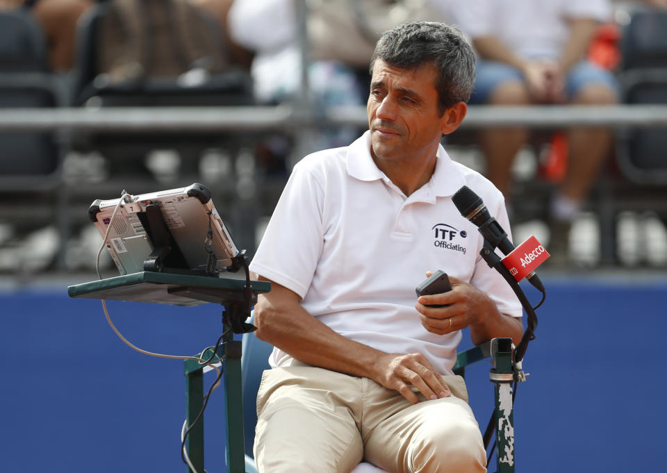 Chair umpire Carlos Ramos issued a code violation without incident during Davis Cup play on Sunday. (AP)