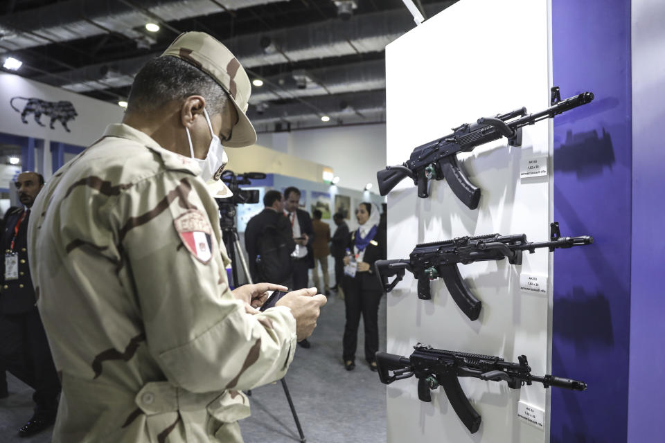 A soldier visits the EDEX Egypt Defence Exhibition 2021 at new Cairo, Egypt, Tuesday, Nov. 30, 2021. Egypt has concluded its second international weapons fair. The country has one of the Middle East’s largest armies, ranks as a top global arms importer and is looking to grow its arsenal while moving away from U.S. suppliers. (AP Photo/Mohamed El-Shahed)