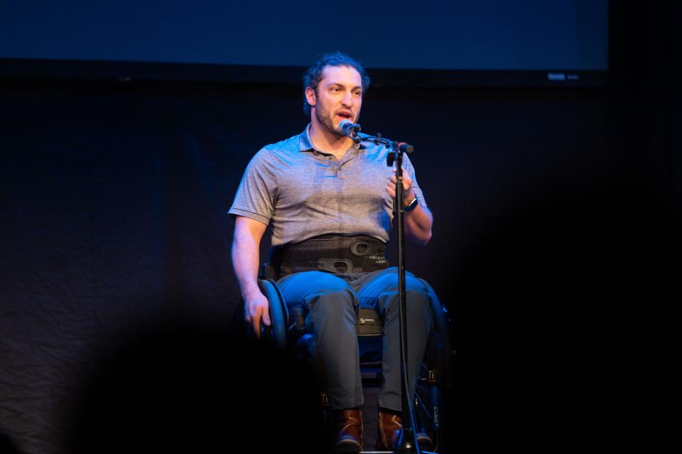 Guillermo Romano Ibarra tells his story during the Des Moines Storytellers Project's "Generosity" show at Hoyt Sherman Place in Des Moines on Tuesday, Dec. 13, 2022.