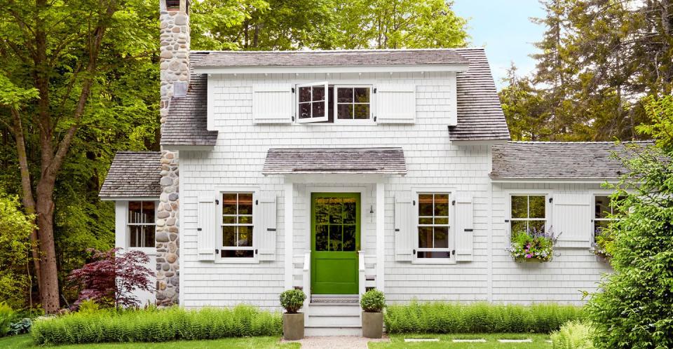 white house with green door