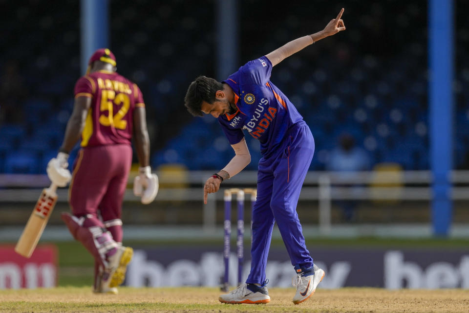 India's Yuzvendra Chahal celebrates dismissing West Indies' Rovman Powell during the first ODI cricket match at Queen's Park Oval in Port of Spain, Trinidad and Tobago, Friday, July 22, 2022. (AP Photo/Ricardo Mazalan)