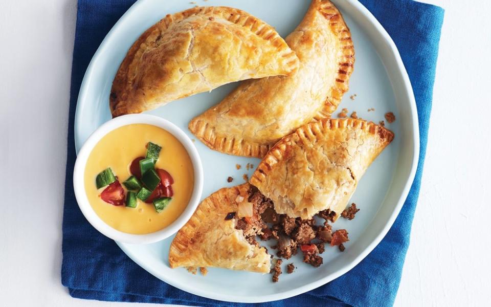 <p>Suzanne Van Atten</p><p>These empanadas have ground turkey, chiles and salsa with a cheesy jalapeño dipping sauce.</p><p><strong>Get the recipe:</strong> <a href="https://parade.com/886284/parade/taco-turkey-empanadas/" rel="nofollow noopener" target="_blank" data-ylk="slk:Taco Turkey Empanadas;elm:context_link;itc:0;sec:content-canvas" class="link ">Taco Turkey Empanadas</a></p>