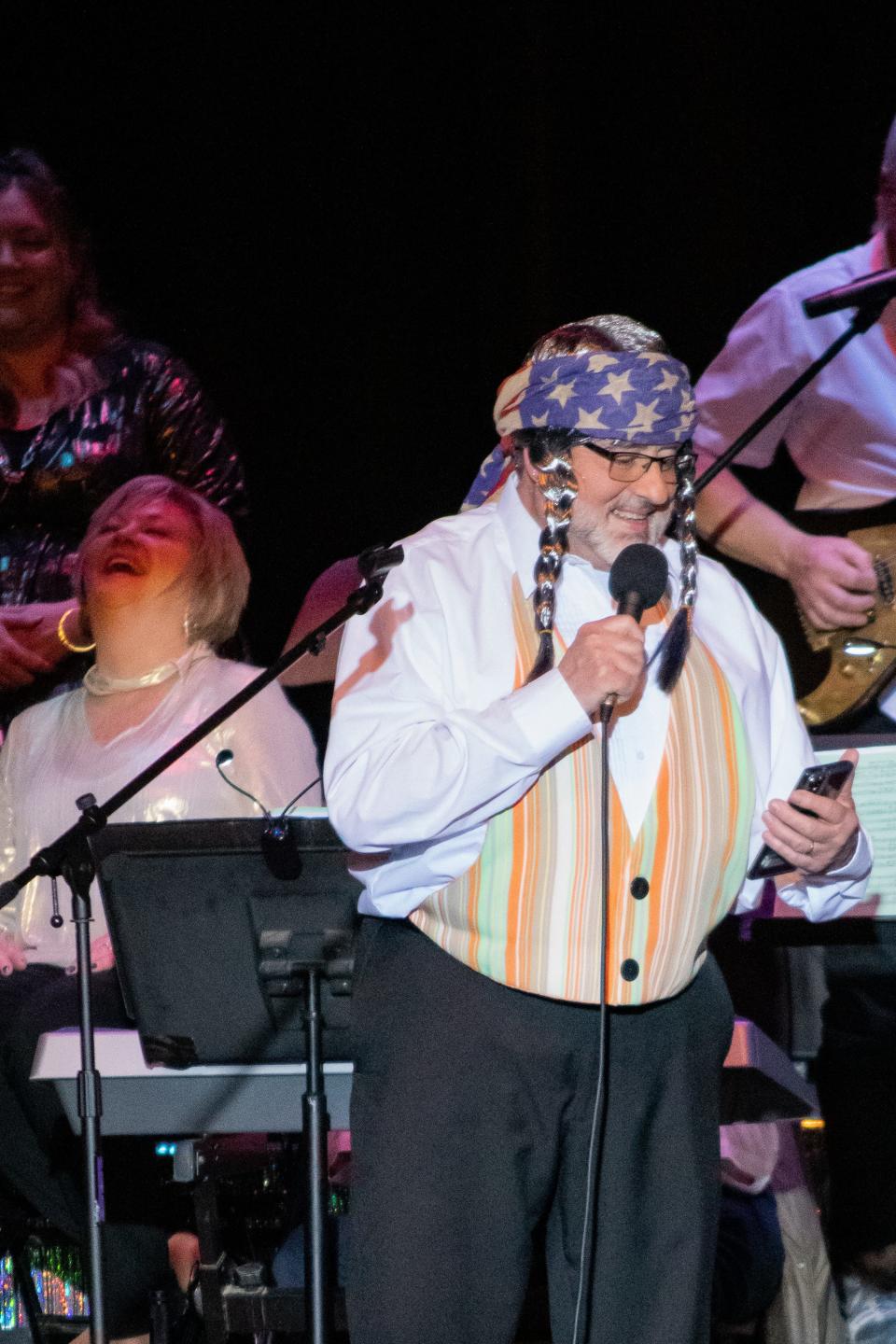 Guernsey County Commissioner Dave Wilson wears a Willie Nelson wig as he portrays the singer at the 2023 Lions Club show. The show returns March 21-23, running at 7 p.m. Thursday, Friday and Saturday at the civic center.