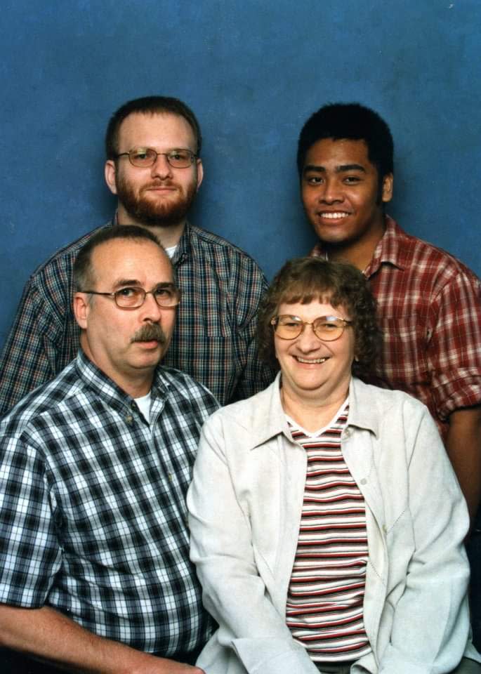 Philp Smith pictured with his parents, James and Donna Smith (bottom) and older brother David Smith (top left).
"Philip was Philip," Donna Smith said, praising her son's creativity and outgoing nature. "He brought a lot of talents and a lot of abilities into our family that we didn't have."